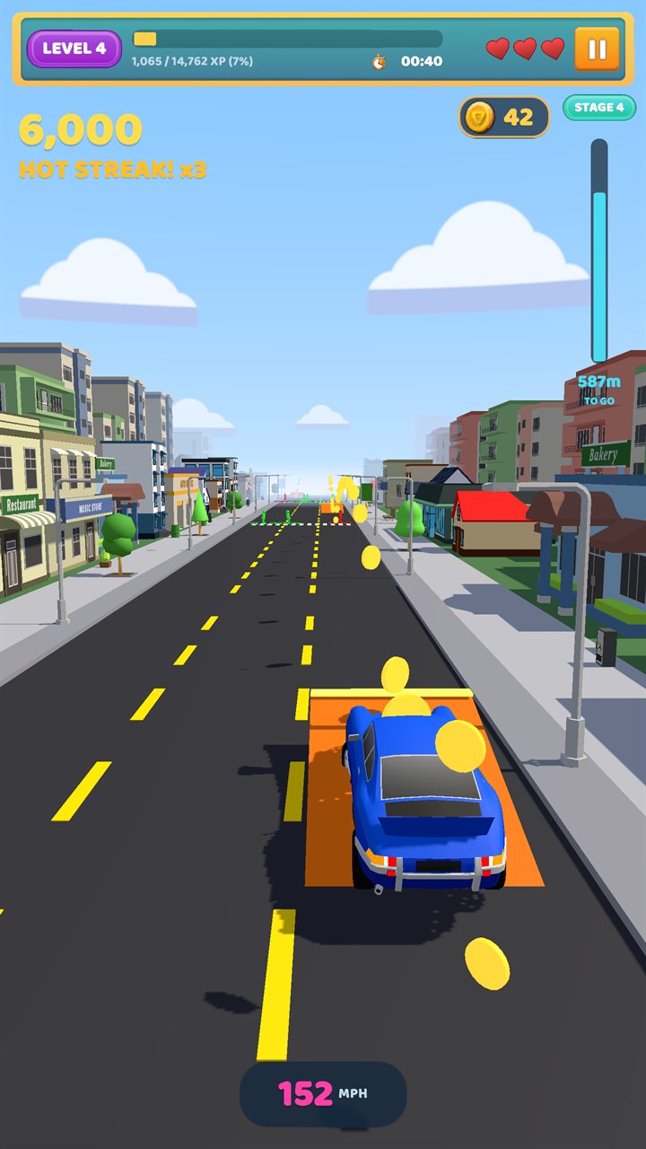 The car hitting an orange ramp and scooping up a trail of gold coins at 152 MPH on a hot streak.
